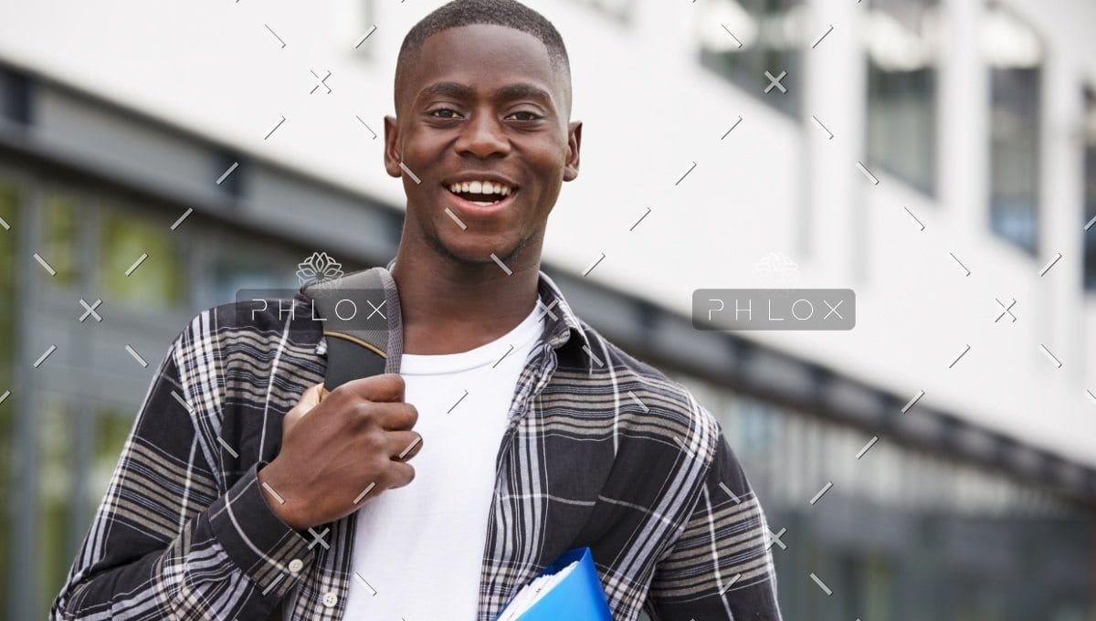 demo-attachment-1115-portrait-of-male-student-standing-outside-college-P9XQ4UM